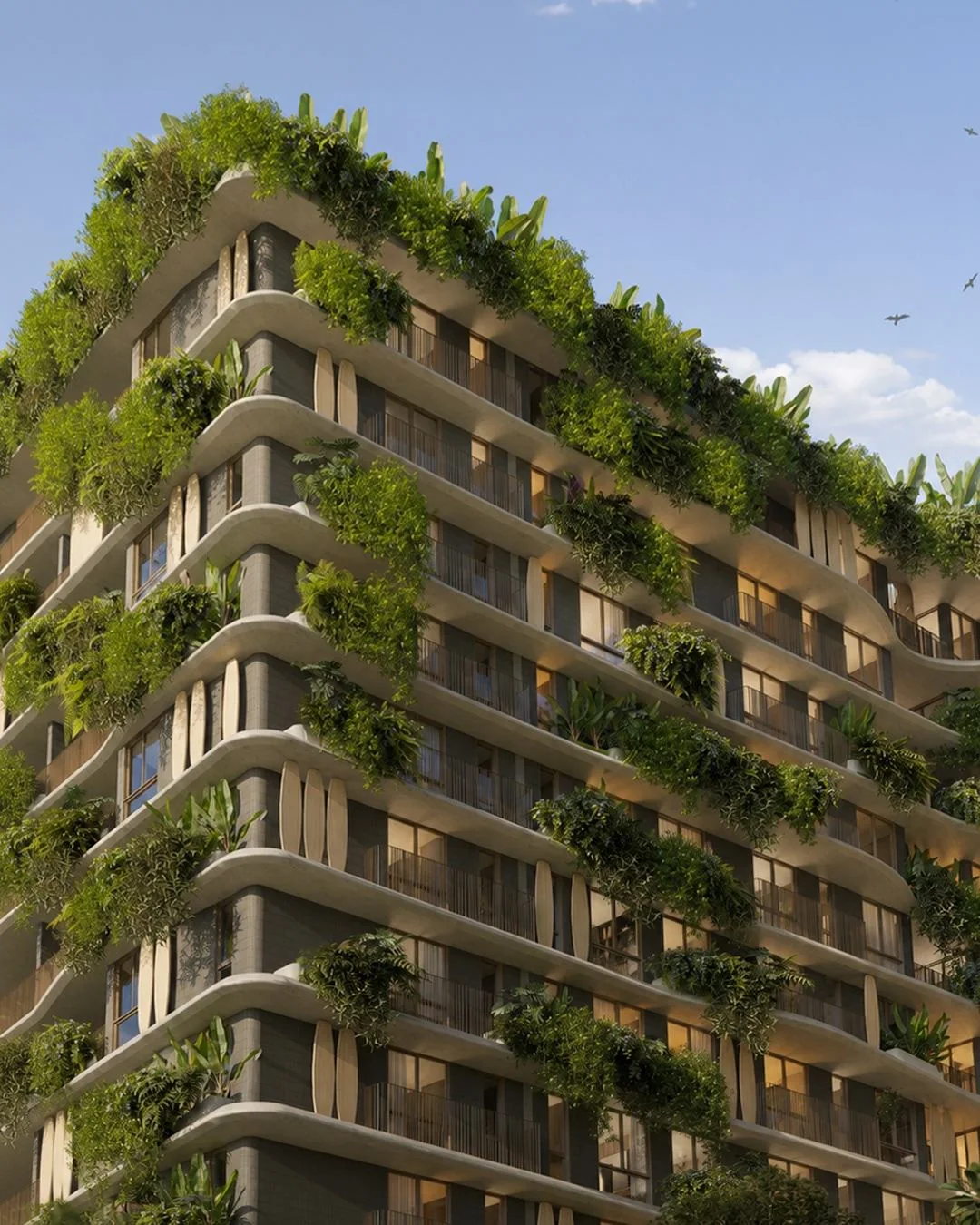 Edifício com floreiras na fachada